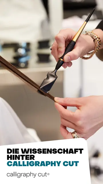 Calligraphy-Cut-Werkzeug wird präzise an einer Haarsträhne geführt